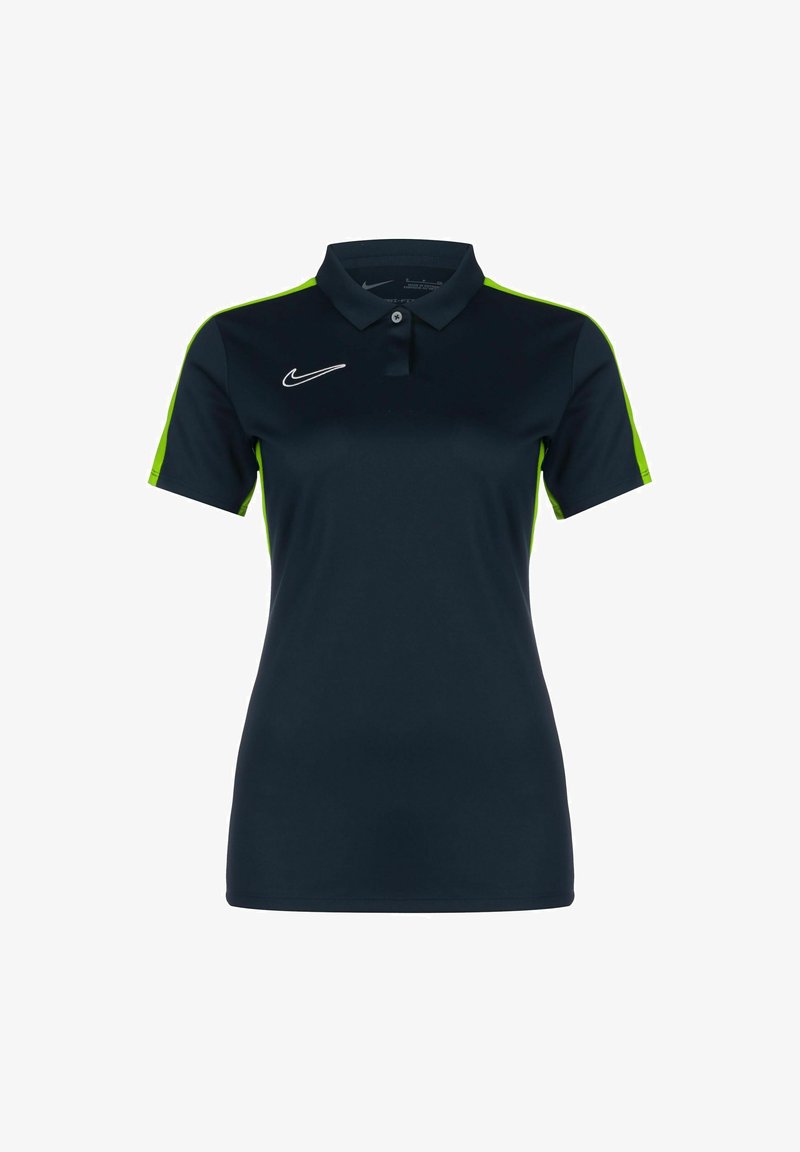 Marineblaues Poloshirt mit limonengrünen Akzenten, aus glattem Stoff. Verfügt über einen Kragen, drei Knöpfe und ein weißes Nike-Logo auf der Brust.