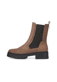 Brown suede ankle boot with black elastic side panels, a back loop, and a chunky black sole, featuring a smooth texture and minimal stitching.