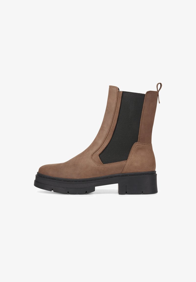 Brown suede ankle boot with black elastic side panels, a back loop, and a chunky black sole, featuring a smooth texture and minimal stitching.