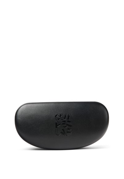 Black glasses case with a textured surface, oval shape, and embossed logo on the front. Material appears durable and smooth.