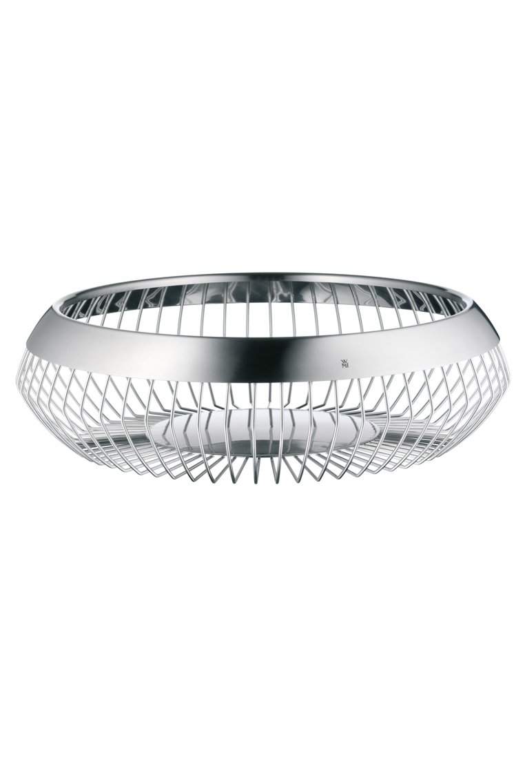 Metalowa miska na owoce o zakrzywionym wzorze z drutu, wykończenie w kolorze srebrnym, otwarta struktura siatki i gładka okrągła podstawa. Nowoczesna i lekka.