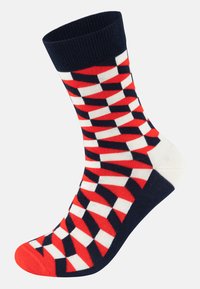 Chaussette multicolore en bleu marine, rouge et blanc avec un motif géométrique en losanges. Poignet côtelé, talon et orteil renforcés. Matière en mélange de coton.