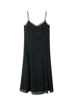 Robe nuisette noire à pois blancs, fines bretelles, bordure en dentelle au niveau de l'encolure et ourlet évasé, présentée sur fond blanc.