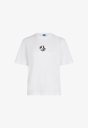 Valge lühikeste varrukatega T-särk, millel on ümmargune kaelus ja väike must "KL" logo rinnus keskel.