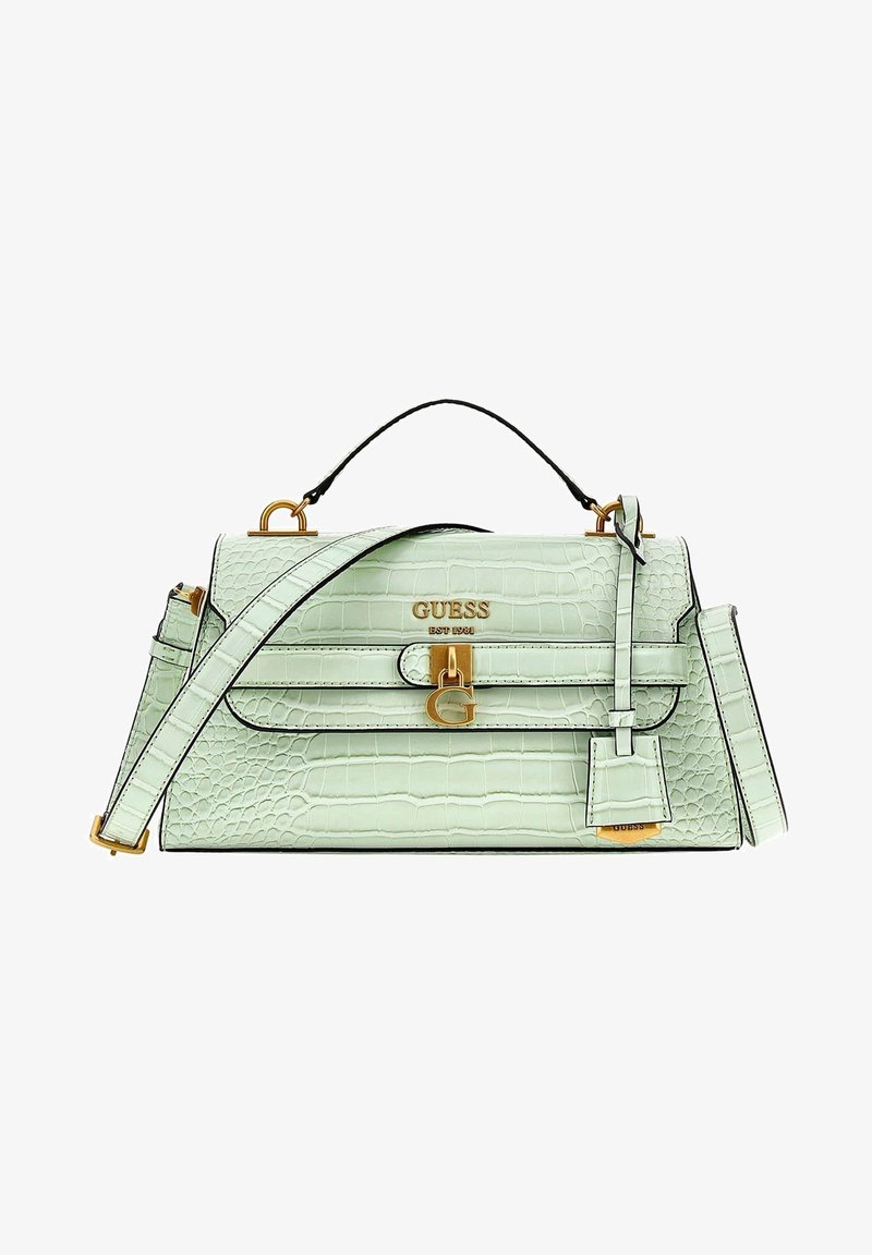Sac à main vert clair à texture crocodile, avec poignée supérieure, bandoulière réglable, fermeture dorée et marquage "GUESS" sur le devant.