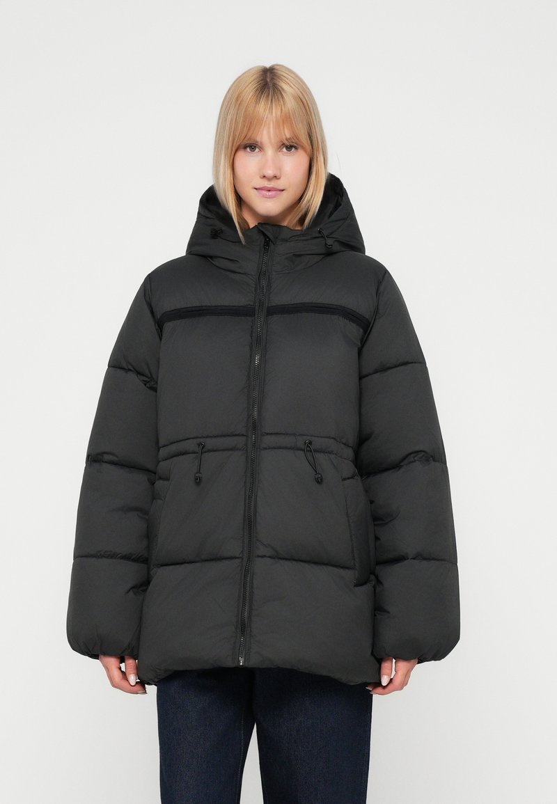 Black puffer jacket with a hood, featuring a front zipper, elastic drawstrings, and a quilted design with a matte finish.