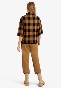 Apart Strickpullover - black