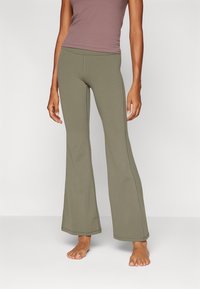 Athleta ELATION FLARE PANT - Leggings - jungle green