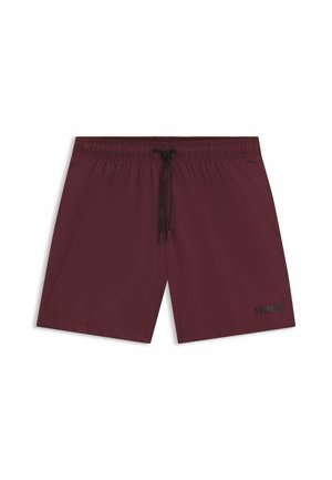 Sukkelahjuh maroon med elastisk liv, snøring og sort "HUGO" logo på nedre venstre side. Glatt tekstur.