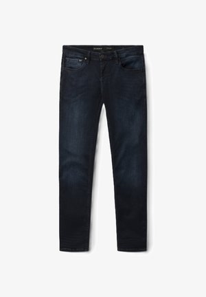 Tamsiai mėlynos spalvos liesos tiesės džinsai iš medvilninio džinso audinio. Turi priekinės kišenes, sagos užsegimą ir subtilų blukimą šlaunų srityje.