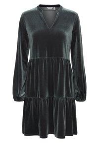 Mörkgrön sammetsklänning med långa ärmar, V-ringning och flodande volanger, med en mjuk textur och svävande siluett.