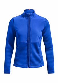 Blå zip-up jacka med ribbad struktur på ärmarna och den nedre delen av kroppen, med hög krage och sidofickor.