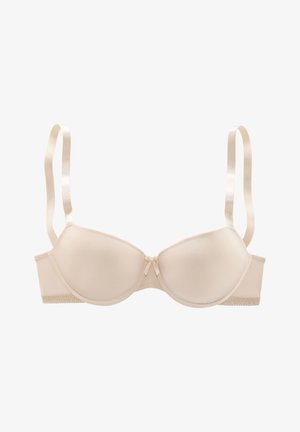 Beige padded bra with smooth fabric, adjustable straps, and a small bow detail at the center; lace trim along the band.