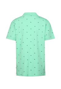 Polo à manches courtes en coton vert menthe, avec un motif intégral de petites ancres noires. Col classique et coupe régulière.