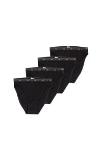 Pantaloni in cotone neri con una cintura elastica abbinata caratterizzata da un design a pois. Quattro paia esposti in un' disposizione sovrapposta.