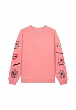 Pink sweatshirt with long sleeves. Features various graphic prints in black and colorful embellishments on the arms. Crew neck design.