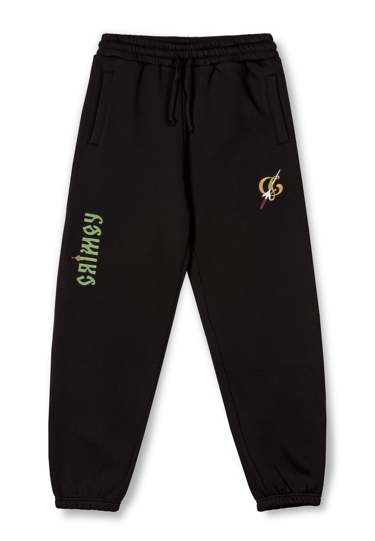 Schwarze Sweatpants aus weichem Material mit einem elastischen Bund, Seitentaschen und kontrastierenden grünen und goldenen Logos am linken Bein.