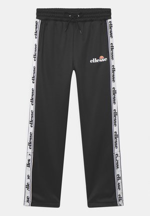 Pantalon de jogging noir avec des bandes blanches sur les côtés présentant des logos "ellesse" répétés et un logo orange et blanc "ellesse" sur la cuisse gauche.