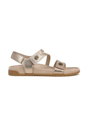 Open-toe flat sandal with metallic textured straps, cushioned beige footbed, adjustable hook-and-loop closures, and a rubber sole.