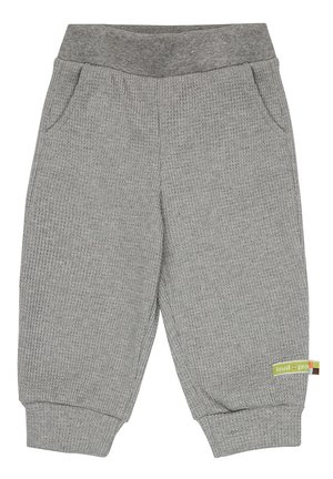 Grijze geribbelde sweatpants met een elastische tailleband, zijzakken en elastische boorden. Voorzien van een klein meerkleurig merkteken.