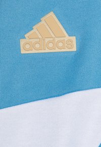 adidas Performance TIRO NATIONS PACK UNISEX - Treniņjaka - light blue/white/black/hazy beige