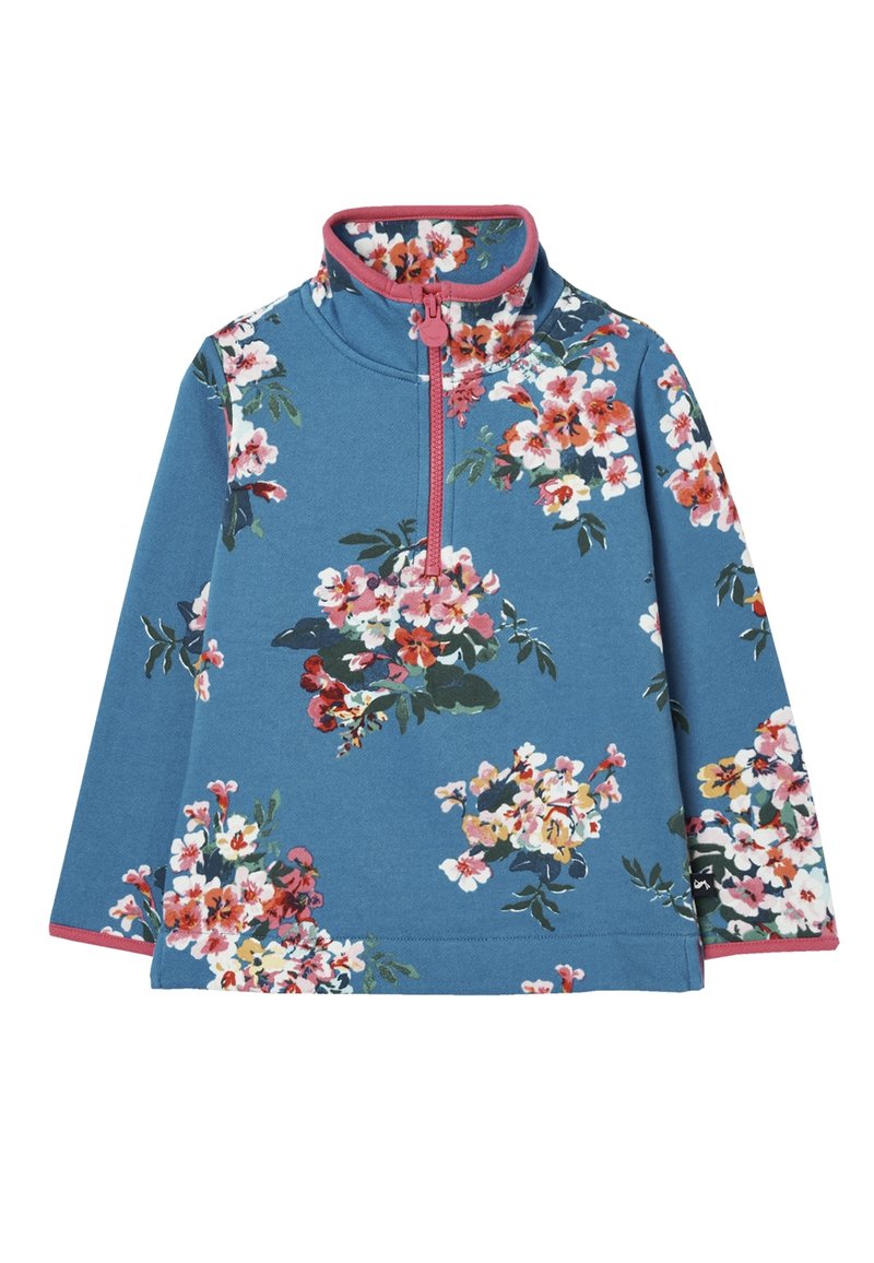 Pull bleu à manches longues avec fermeture éclair rose et motif floral en blanc, rose, rouge et vert, avec un col montant et des bordures roses aux manches.