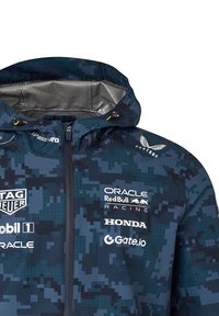 Navy blue kurtka w wzór kamuflażu z kapturem, z logo TAG Heuer, Oracle, Red Bull Racing i Honda. Zamek błyskawiczny z żółtą zawleczką.