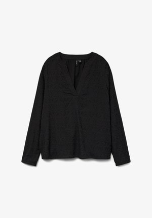 Blouse noire à manches longues avec un décolleté en V, motif texturé et coupe ample. Le tissu semble léger et doux, ce qui augmente le confort.