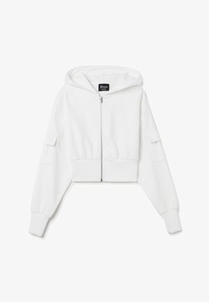 Sudadera blanca recortada con cremallera y capucha, con puños acanalados y un bolsillo frontal en cada manga. Fabricada con un tejido suave y liso.