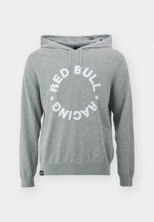 Grå hoodie i mjukt material, med en främre grafik som säger "RED BULL RACING" i vitt, samt en ficka i fram med kengurudesign och ribbade muddar.