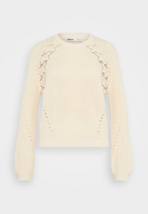 Cremefarbener Strickpullover mit Rundhalsausschnitt, langen Puffärmeln und Spitzenmusterdetails an den Schultern. Strukturiertes Material.