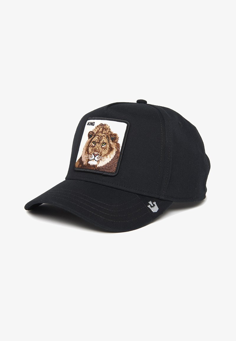 Black cap featuring a square embroidered patch of a lion's face with the text “KING” above. The brim has subtle stitching details.