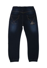 Pantalons joggers en denim bleu foncé avec une taille élastique, des ourlets à revers et deux poches arrière avec des détails de couture contrastés.