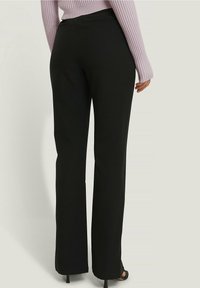 NA-KD Kalhoty - black
