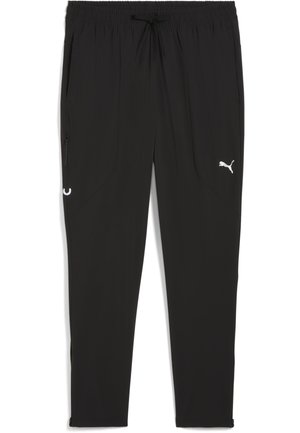 Pantalons de sport noirs avec une taille élastique et un cordon de serrage. Comprend deux poches latérales et un logo Puma blanc sur la cuisse gauche.