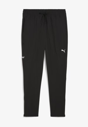 Crne sportske hlače s elastičnim pojasom i vezicom. Imaju dva bočna džepa i bijeli Puma logo na lijevoj nozi.