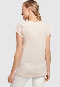 Merchcode MERRY CHRISTMAS AND HAPPY ALWAYS EXTENDED SHOULDER TEE - T-shirts print - pink