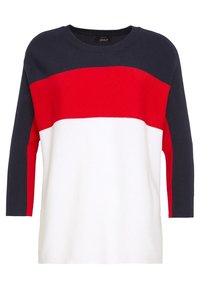 Stickad tröja med marinblå, röd och vit horisontella färgblock; ribbad rundad halsringning; trekvartslånga ärmar; mjuk textur.