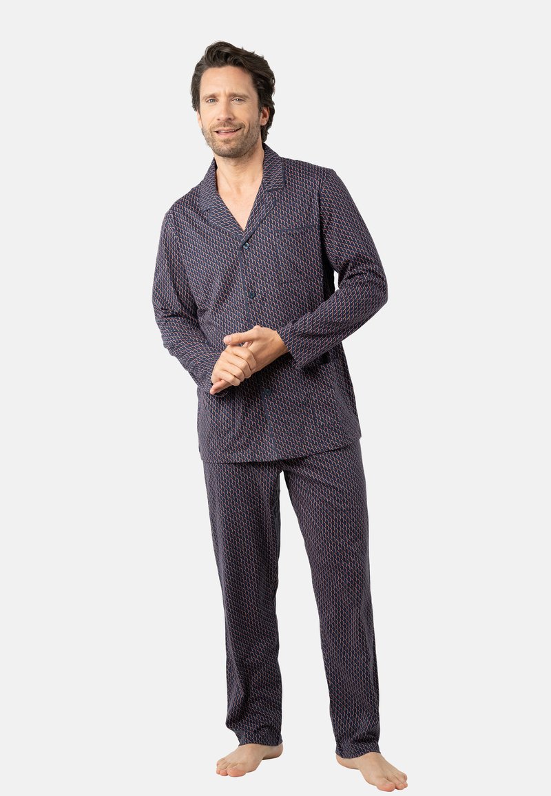 Ensemble de pyjama en coton à motifs marins avec manches longues, chemise à boutons et pantalons assortis. Présente un motif géométrique aux couleurs contrastées.
