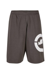 Gray athletic shorts with an elastic waistband, featuring a large white logo design on the left leg and smooth, lightweight fabric.