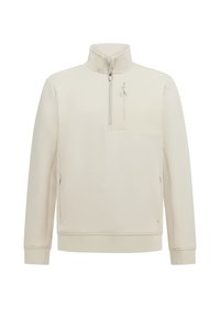 Pullover color beige chiaro realizzato in tessuto morbido, con colletto alto, chiusura a zip quarti e tasca frontale con zip. Texture liscia.