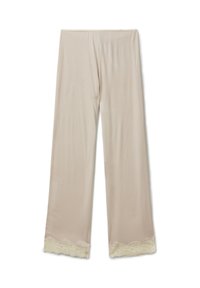 Béžové široké kalhoty vyrobené z měkké tkaniny s texturovaným krajkovým lemem na spodním okraji, s volným střihem a elastickým páskem.