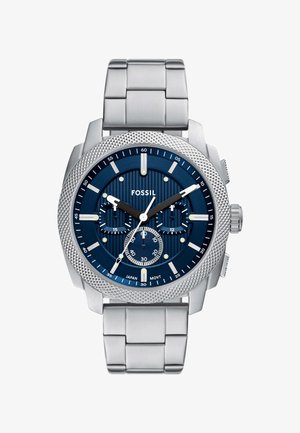 Montre chronographe pour hommes Fossil avec un cadran texturé bleu, un boîtier en acier inoxydable argenté et un bracelet. Comprend plusieurs sous-cadrans et une lunette texturée.