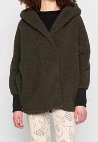 Noisy May Kort kappa / rock - dark green