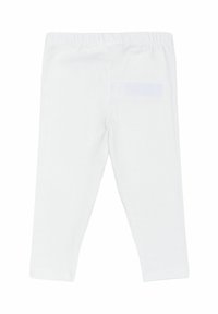 Weiße Baumwollleggings mit elastischem Bund, die ein einfaches Design ohne sichtbare Muster oder Verzierungen aufweisen.
