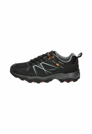 Black athletic shoe featuring a mesh upper, orange accents, grey lining, and textured rubber outsole with deep treads for traction.