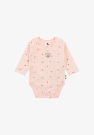 Body bébé rose clair à manches longues, avec un petit imprimé de fleurs orange, des boutons-pressions latéraux, et un petit emblème en forme de visage d'ours sur la poitrine.