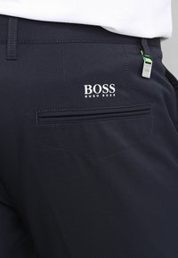 BOSS ATHLEISURE Tygbyxor - dark blue