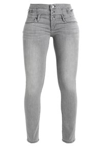 Jeans de mezclilla gris ajustados con cintura alta, cierre de múltiples botones y diseño clásico de cinco bolsillos. Textura suave sin patrones visibles.