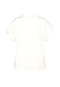 T-shirt blanc à manches courtes, coupe ample et col rond. Texture lisse, design simple sans motifs ni embellissements.
